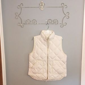 White vest with gold detailing